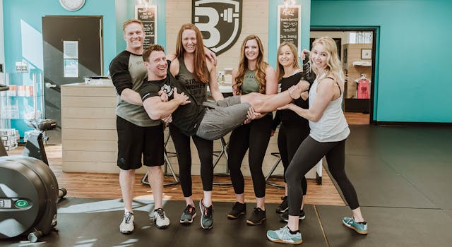 Team holding James