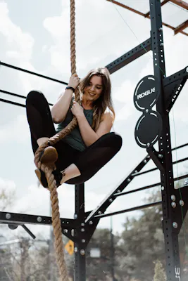 Melissa climbing the rope.