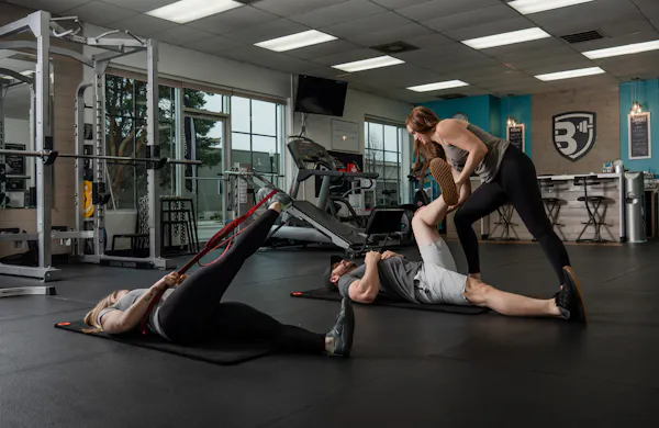 Christine stretching clients.