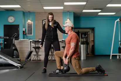 Melissa Training client with kettlebell.